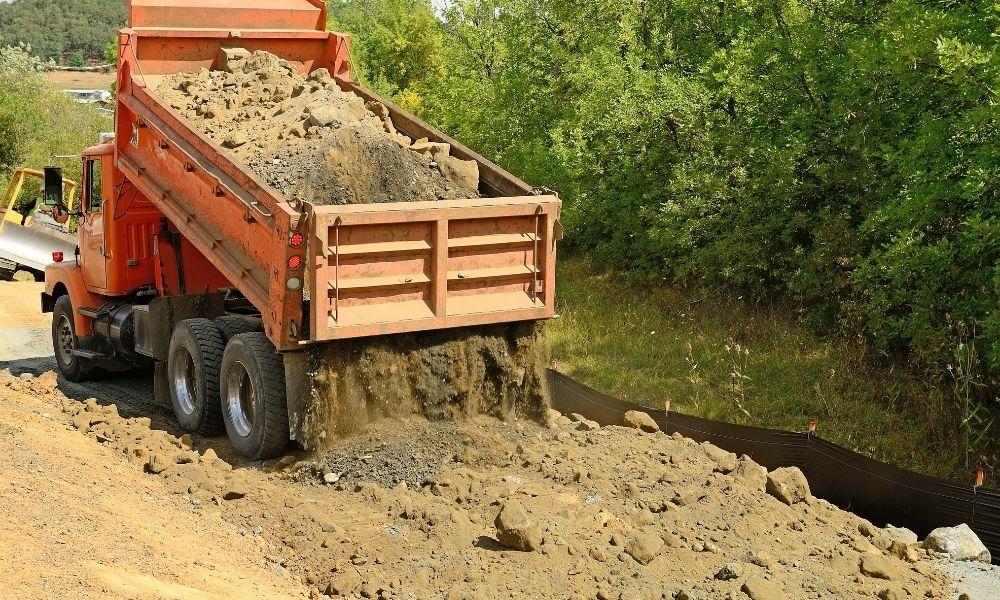 How To Keep Dirt From Sticking in a Dump Truck