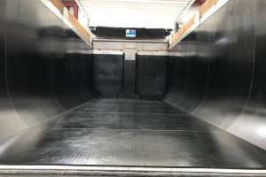 photo of a slightly curved black truck bed liner