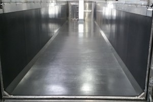 photo of a rectangular truck bed liner with silver floor and black sides