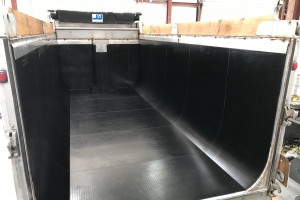 photo of a slightly curved black truck bed liner